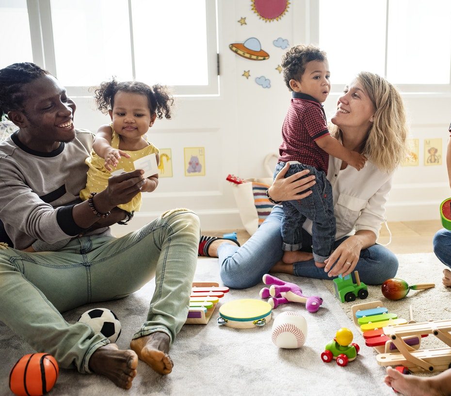 children playing with parents at pre-school