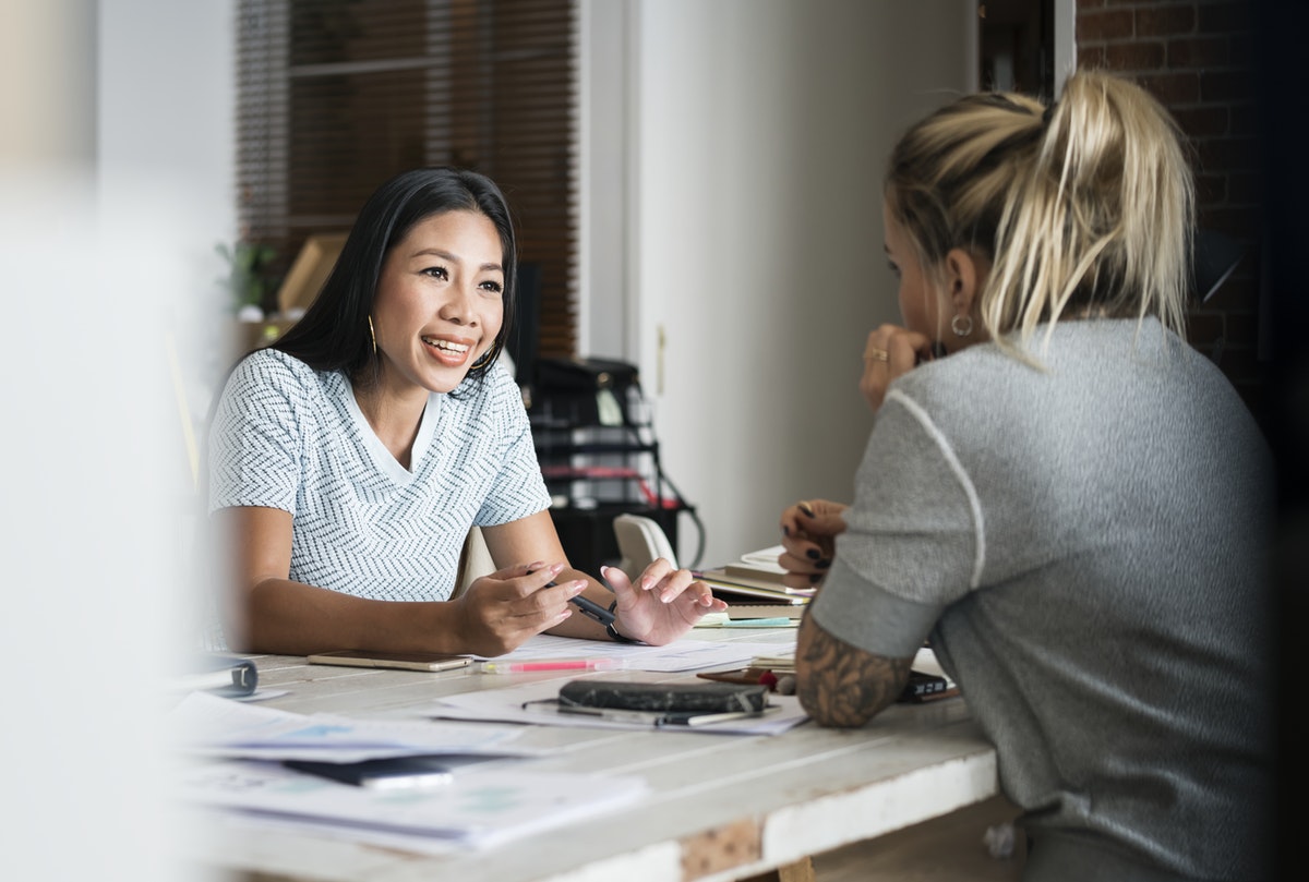 woman talking to her boss